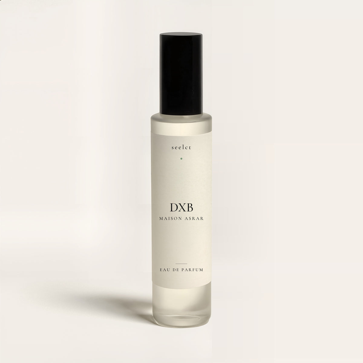 seelct sample vial of DXB by Maison Asrar, clean citrus musk fragrance, on bone background