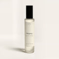 seelct sample vial of Majesty by Maison Asrar, clean citrus musk fragrance, on bone background